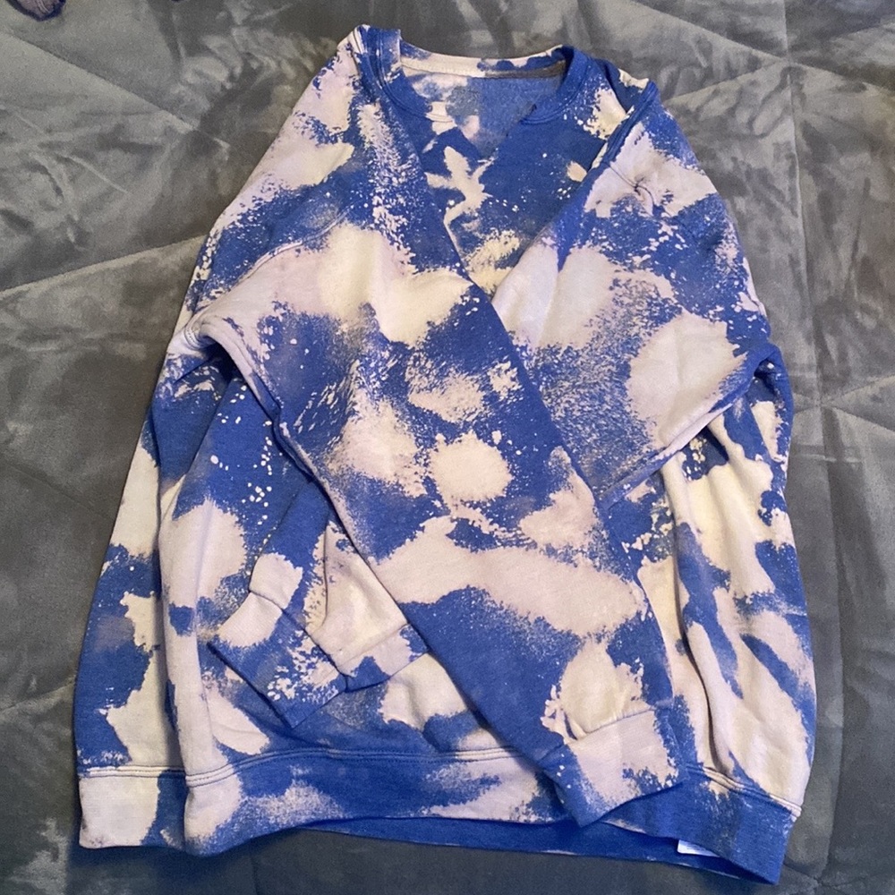 Bleach-dyed light blue crewneck